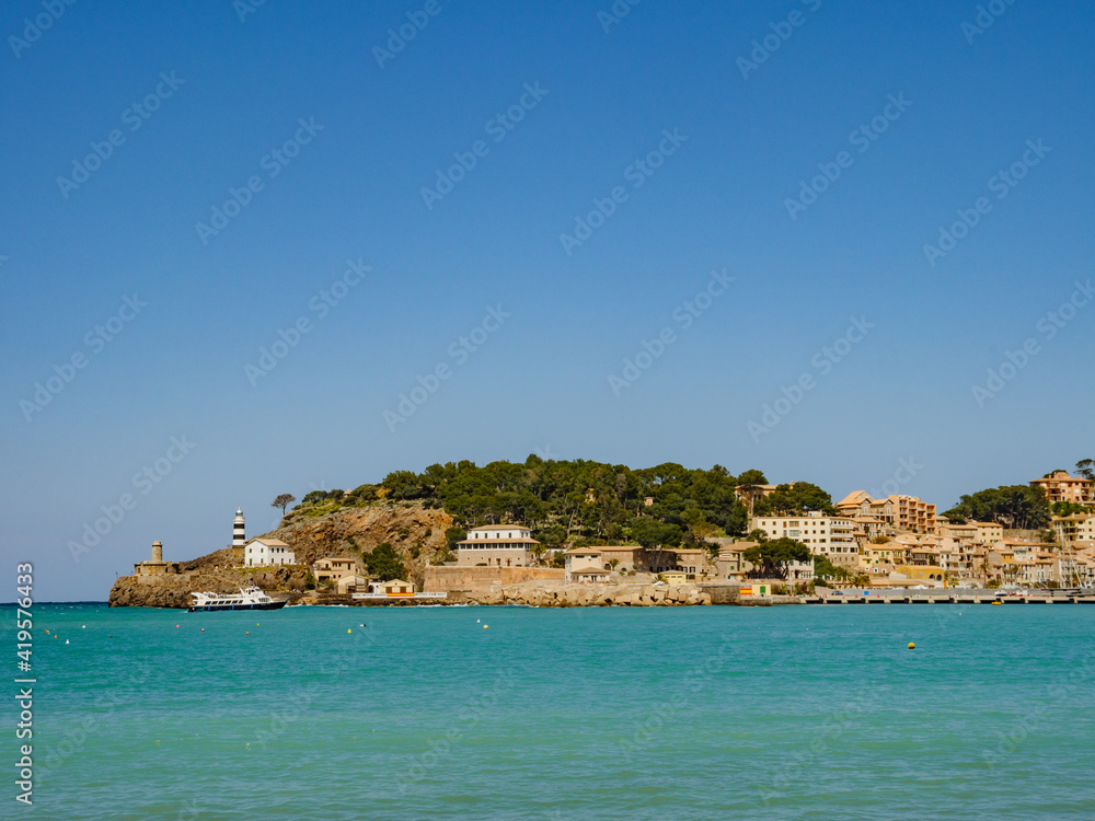 beach with trees in the village of Port de Soller on  the balearic island of Mallorca, spain
