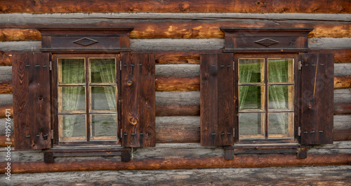 Russian Wooden Log Cabin with Wooden Shutters