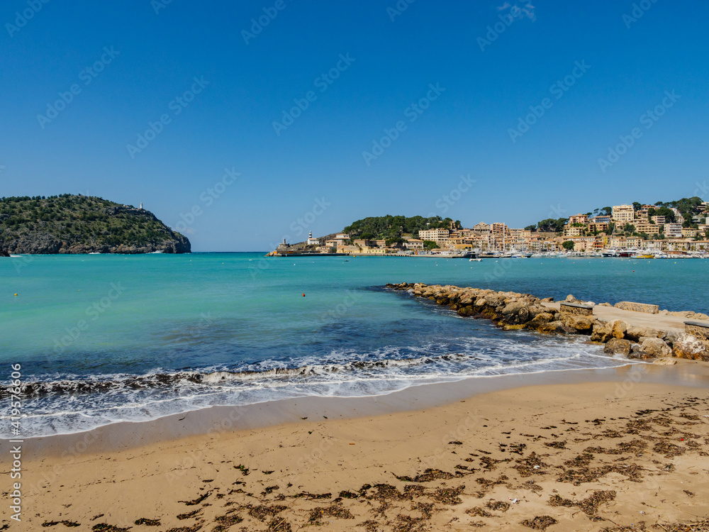 beach with trees in the village of Port de Soller on  the balearic island of Mallorca, spain