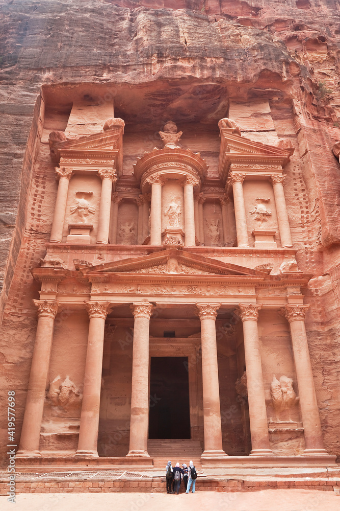 Tourists near the temple of El Khazneh in the capital of the Nabataean Kingdom, Petra, Jordan