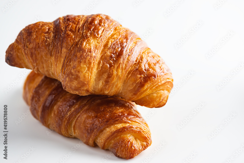 French croissants on a white background.