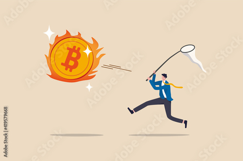 Chasing high performance bitcoin crypto currency in bull market, greedy speculation in Bitcoin trading concept, greedy businessman investor chasing try to catch hot fire flying bitcoin.