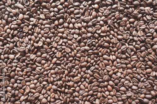 Background of roasted coffee beans close-up