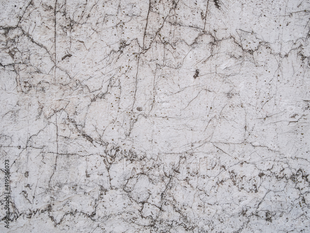 White cracked wall background texture pattern. White cracked wall background texture pattern.