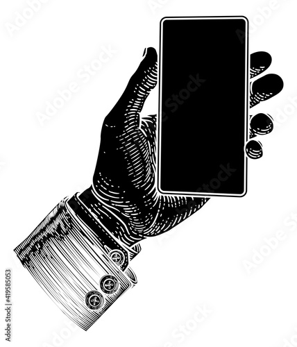 A hand holding a mobile pho...