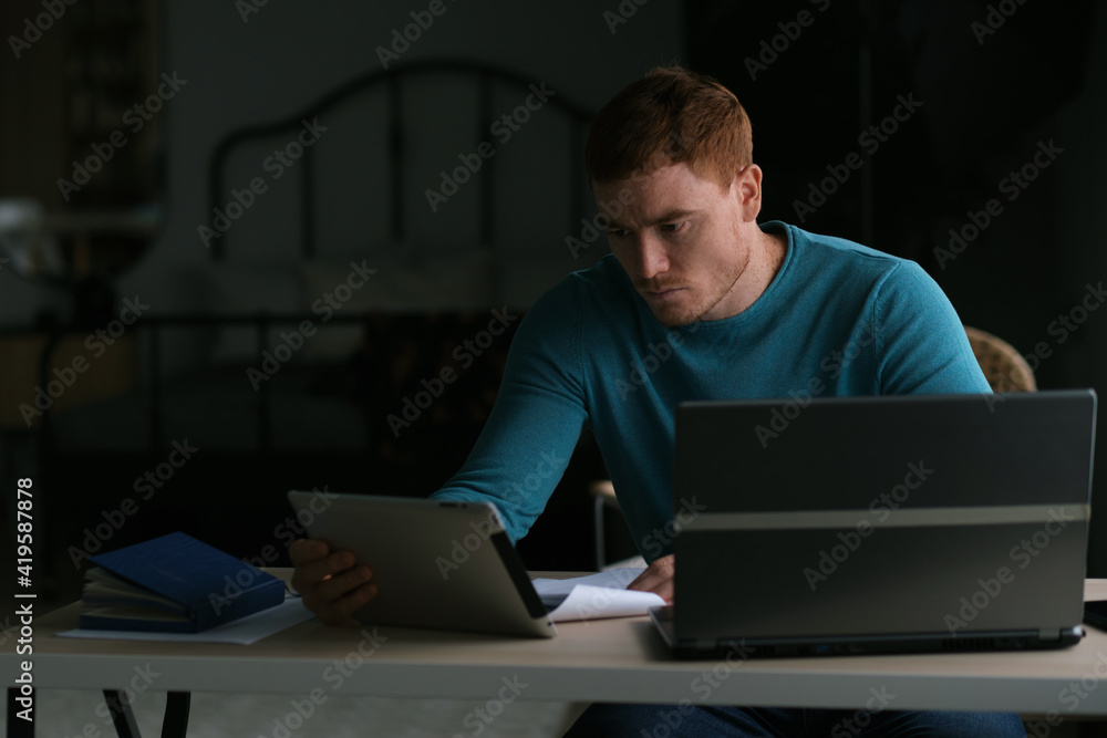 guy works from home. man using laptop, typing on keyboard, writing email or message, chatting, shopping, successful freelancer working online on computer. guy works from home. man using laptop, typing on keyboard, writing email or message, chatting, shopping, successful freelancer working online on computer.