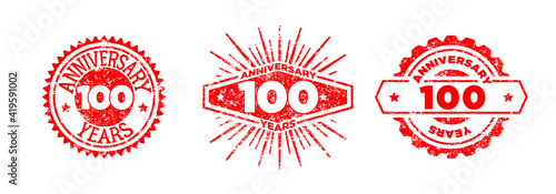 A group of 100 years anniversary logos drawn in the form of stamps, red frames for celebration. Grunge rubber stamp texture. Distressed texture stamp. Collection of postage stamps. Vector round stamps