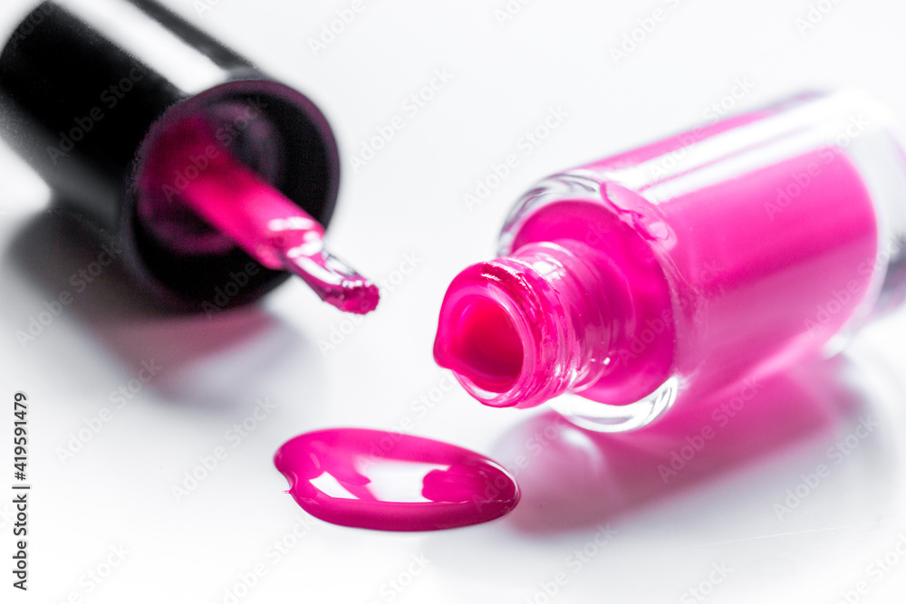 Close up of nail polish in bottles white background space for text Close up of nail polish in bottles white background space for text