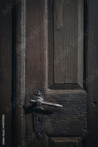 Beautiful architectural detail. Detail of the door, old wood surface.