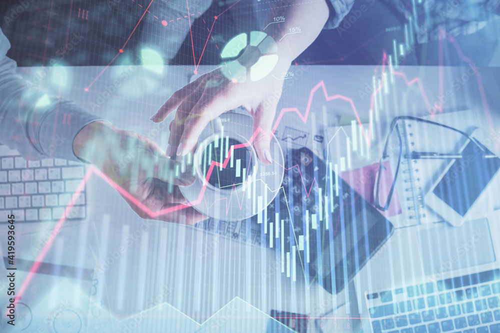 Double exposure of man and woman working together and financial chart hologram drawing. market analysis concept. Computer background. Top View. Double exposure of man and woman working together and financial chart hologram drawing. market analysis concept. Computer background. Top View.