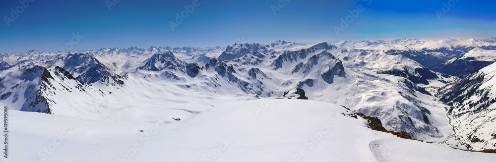 large winter panorama in the swiss mountains. Ski tours in St. Antonien. View to the Schjienflue, Partnun and Sulzfluh. Skimo