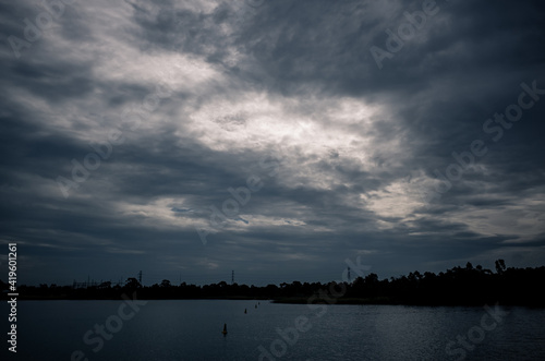 Clouds over a lake © Thanh