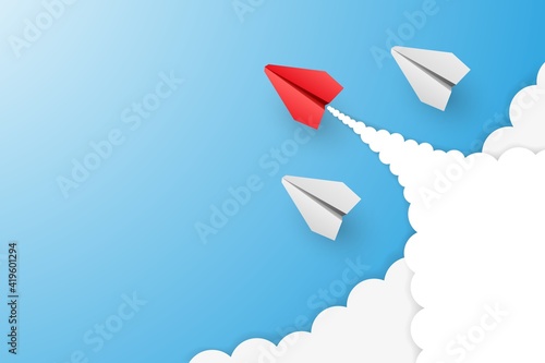 Individual red leader paper plane lead other with clouds. Business and leadership concept