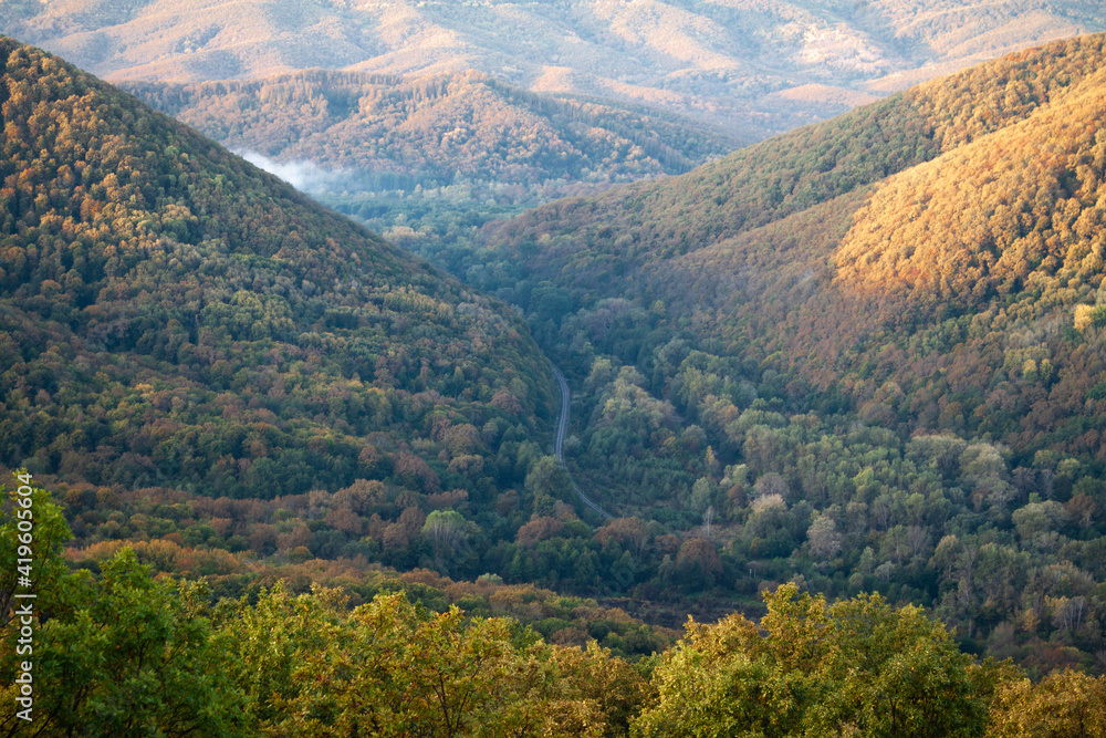 Fototapeta premium Mountain valley through which the railway passes