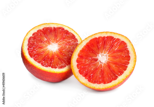 Cut ripe red orange isolated on white