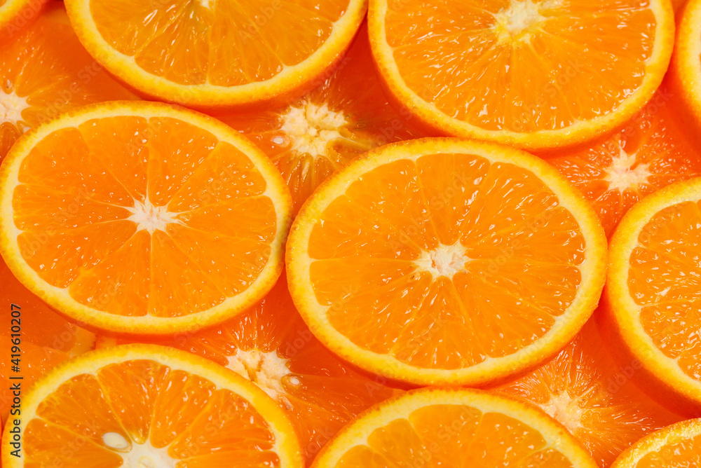 Slices of oranges as a background, top view. Slices of oranges as a background, top view.