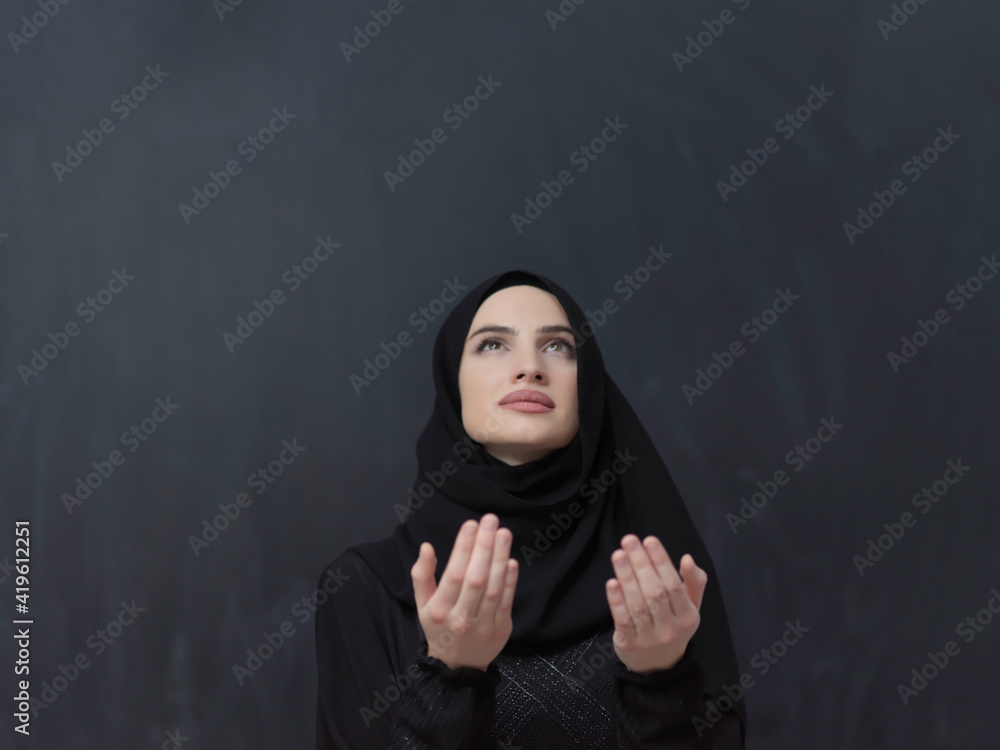 Portrait of young Muslim woman making dua Portrait of young Muslim woman making dua