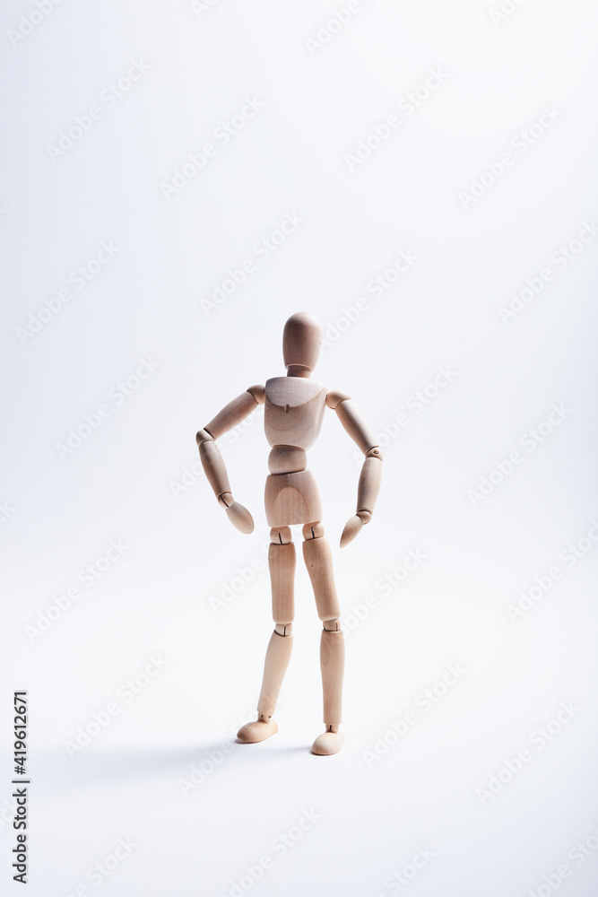wooden mannequin in studio on white background wooden mannequin in studio on white background