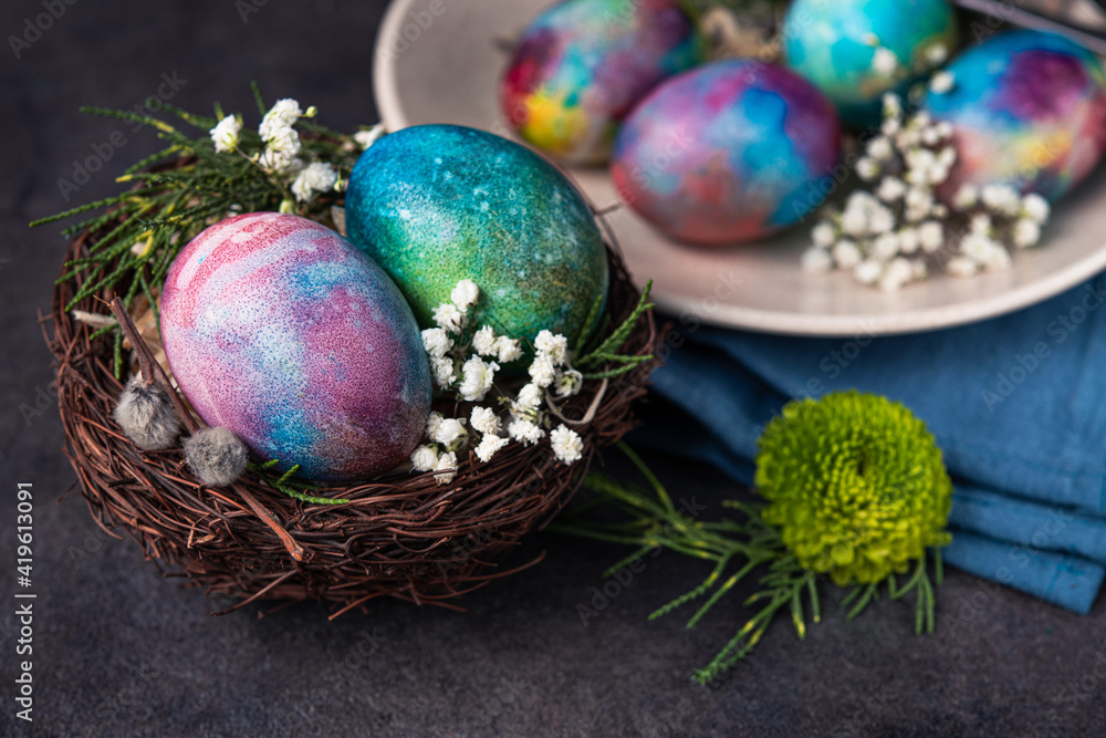 Obraz premium Easter holiday concept with colored space egg