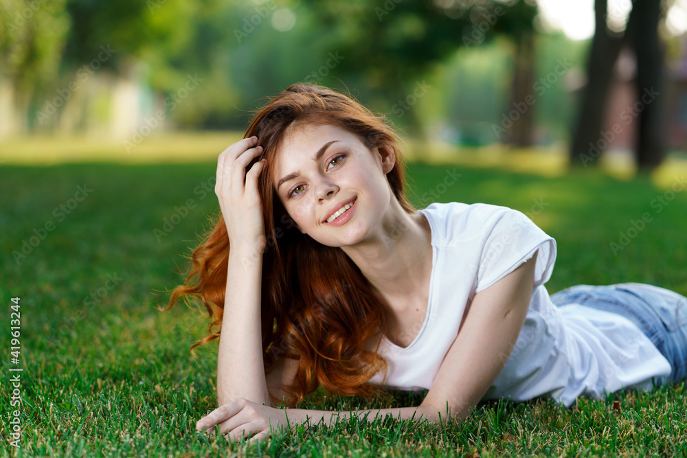 pretty woman lying on the lawn rest charm fresh air pretty woman lying on the lawn rest charm fresh air