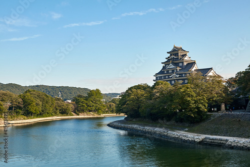 Okayama castle overlooking the Asahi river at sunset, completed in 1597 by Ukita Naoie
