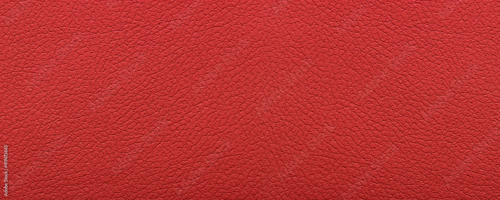 Fototapeta premium Clean red leather fullframe texture. Empty red leatherette closeup macro background.