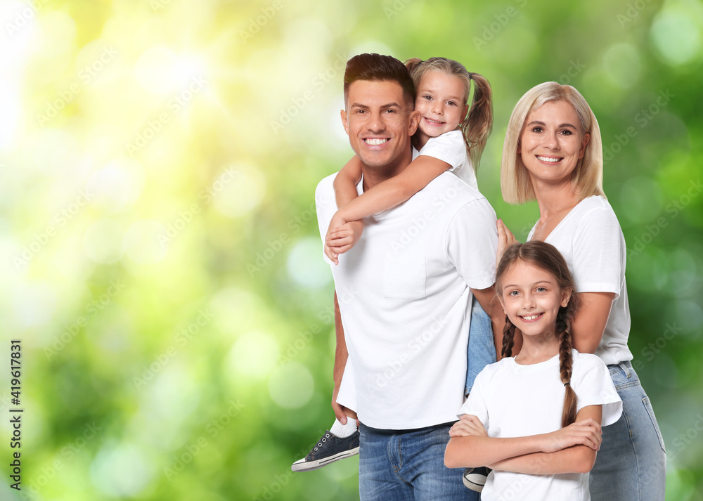 Happy family with children outdoors on sunny day, space for text Happy family with children outdoors on sunny day, space for text