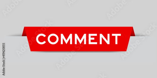 Red color inserted label with word comment on gray background