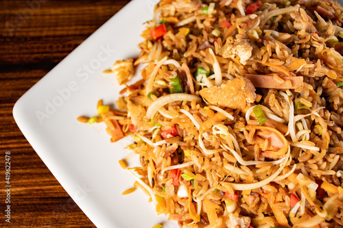 A plate of oriental food special fried rice