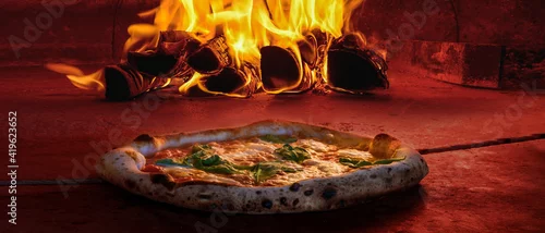 Obraz  z motywem wide image cover photo traditional wood fired pizza oven pizzeria inside 