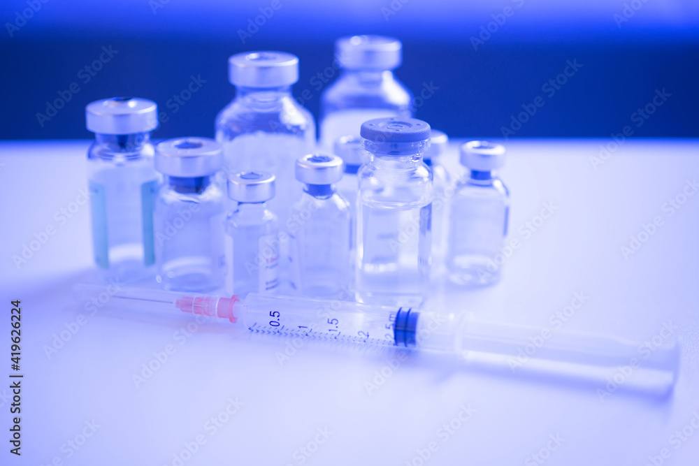 Close up syringes and potions Close up syringes and potions
