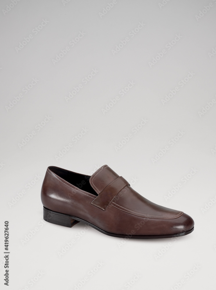Elegant footwear personal accessory for men studio shoot Elegant footwear personal accessory for men studio shoot