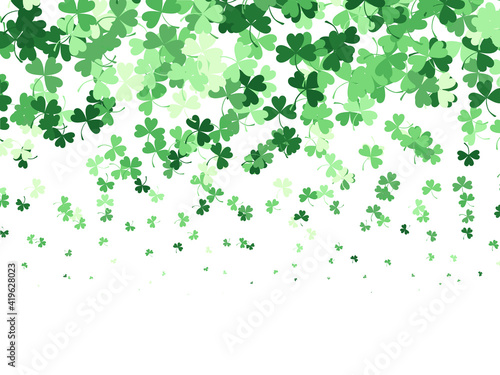 Background with clover leaves of different shades of green. A pattern for St. Patrick's Day. Vector graphics