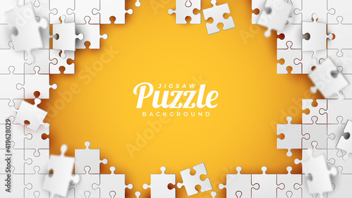 White Jigsaw Puzzle on The Orange Background