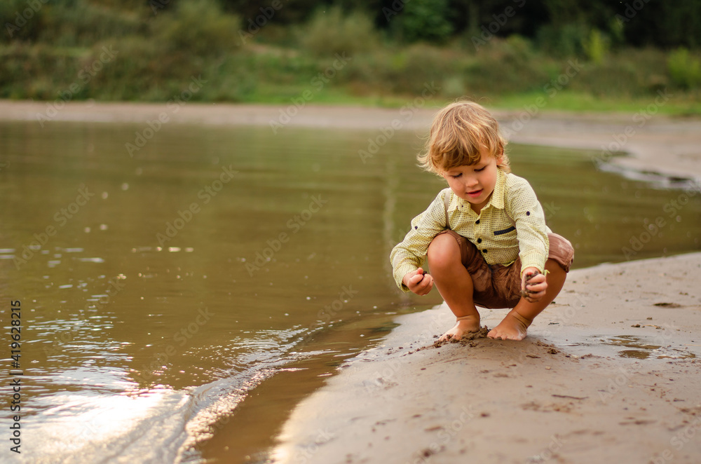 The boy by the river The boy by the river