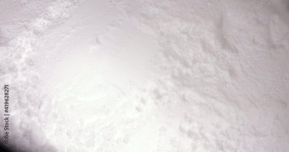Scooping muscle creatine supplement powder Scooping muscle creatine supplement powder