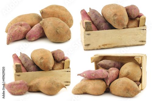 mixed sweet potatoes in a wooden crate on a white background photo