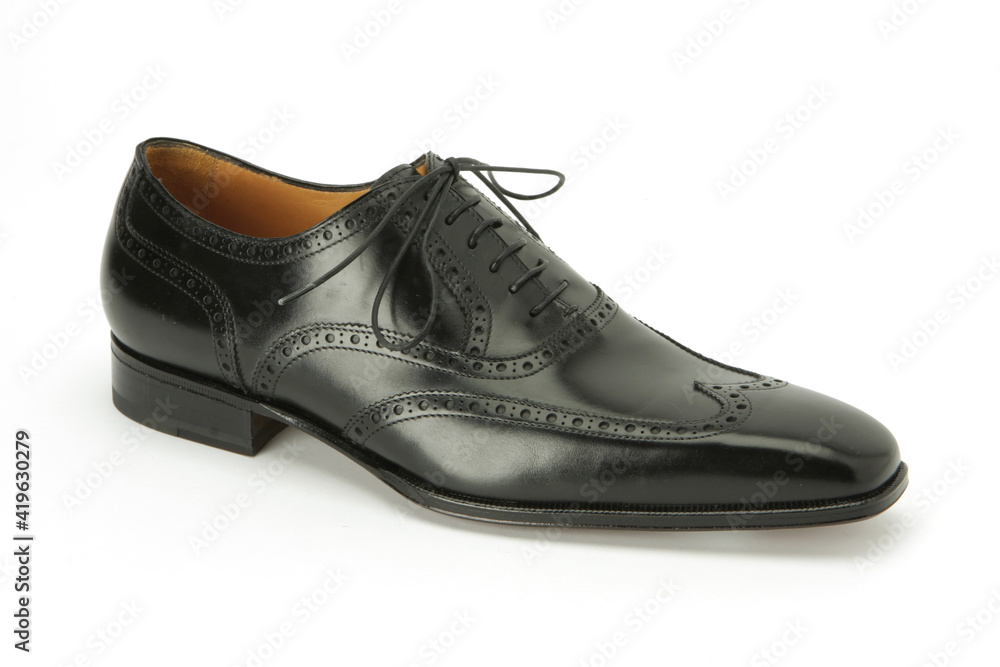 Elegant footwear personal accessory for men studio shoot Elegant footwear personal accessory for men studio shoot