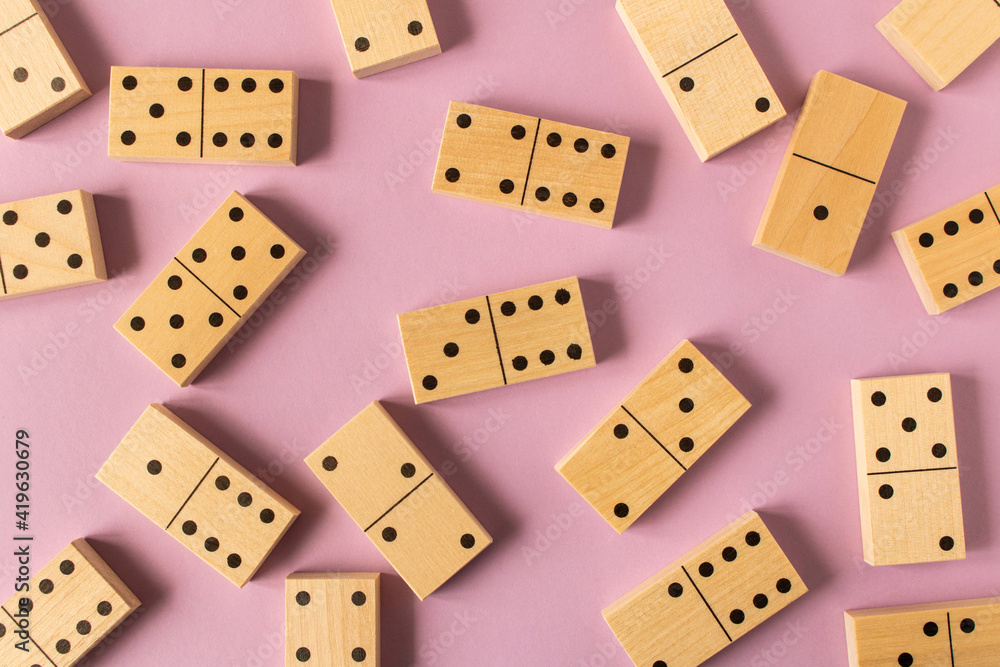 A game of dominoes on a light background. Close-up. Selective focus. A game of dominoes on a light background. Close-up. Selective focus.