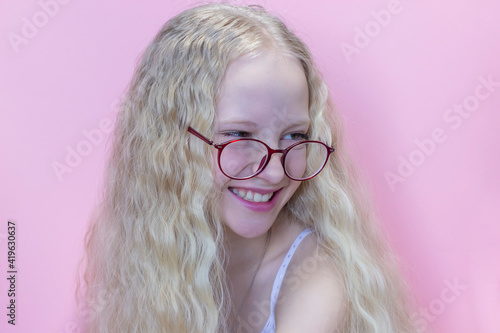 Wallpaper Mural Young blonde girl wearing casual clothes pointing finger up with successful idea. exited and happy. number one Torontodigital.ca