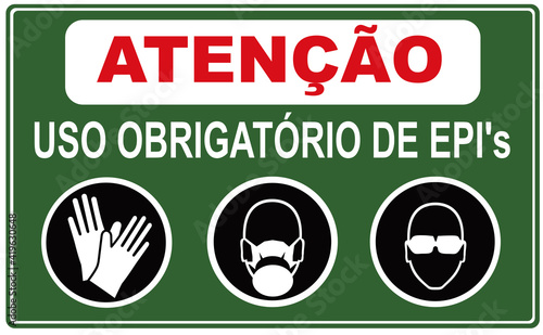 a sign that says in Portuguese language : ATTENTION MANDATORY USE OF industrial protection equipment