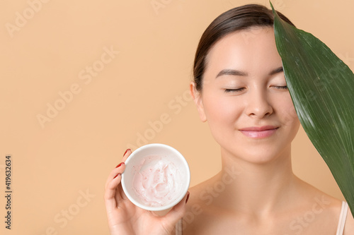 Beautiful young woman with ...