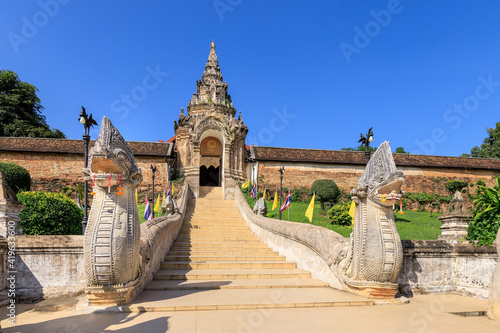 Gate and staircase to Wat Phra That Lampang Luang temple, famous tourist destination, Lampang province, Thailand photo