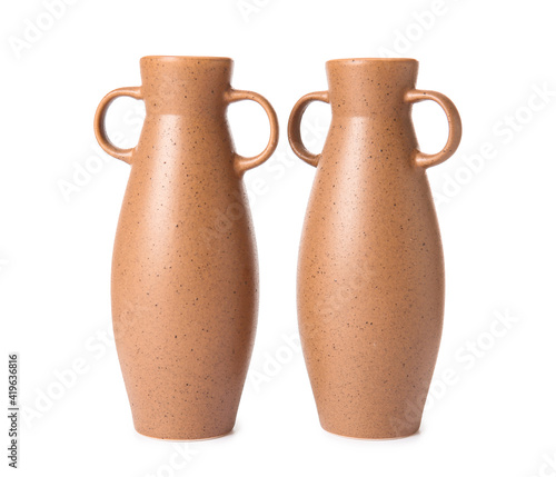 Ceramic amphorae on white background