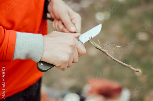 person cutting a tree