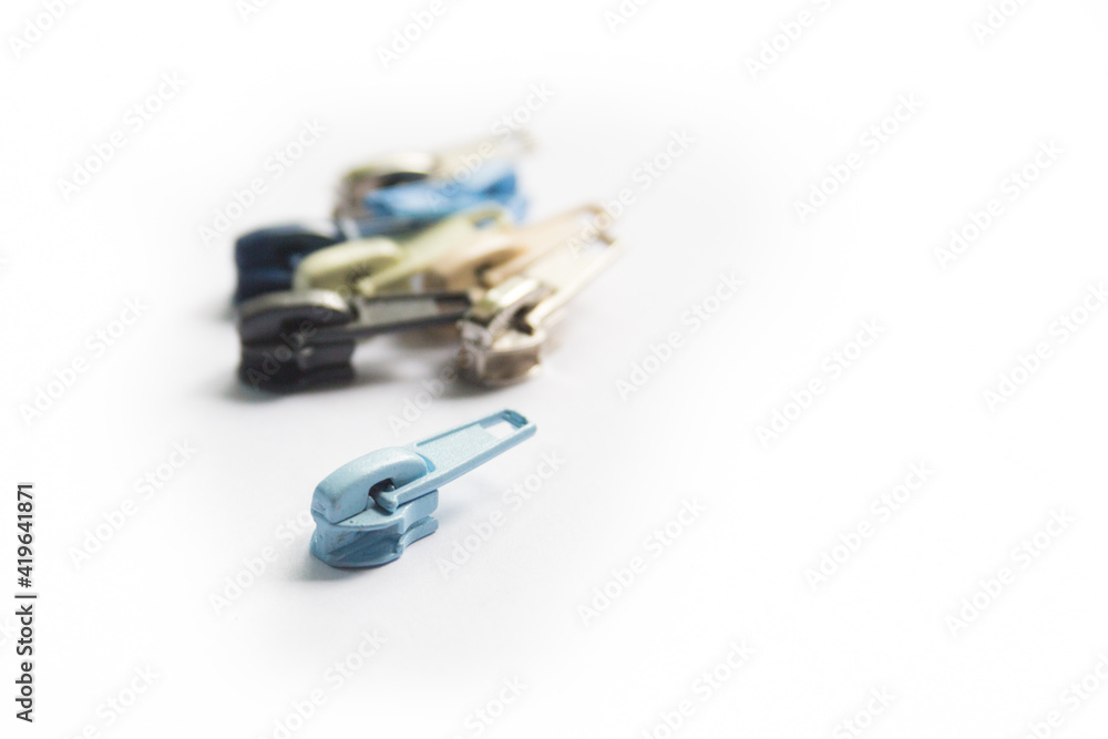 Zipper puller or slider collection isolated on white background Zipper puller or slider collection isolated on white background