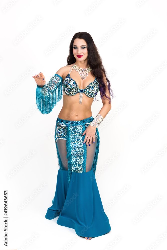 Woman in oriental costume for dance, isolate white background.