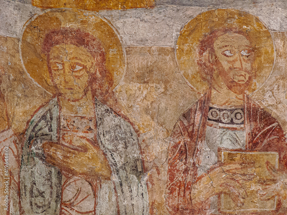 st John the evangelist as a young man and st Paul with a book, romanesque painting from the 1100s.