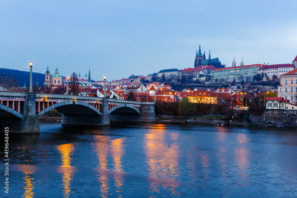 Panorama view of Prague on early morning or dusk night. Beautiful view on old town with bridges and river, the Czech Republic. Empty Charles bridge
