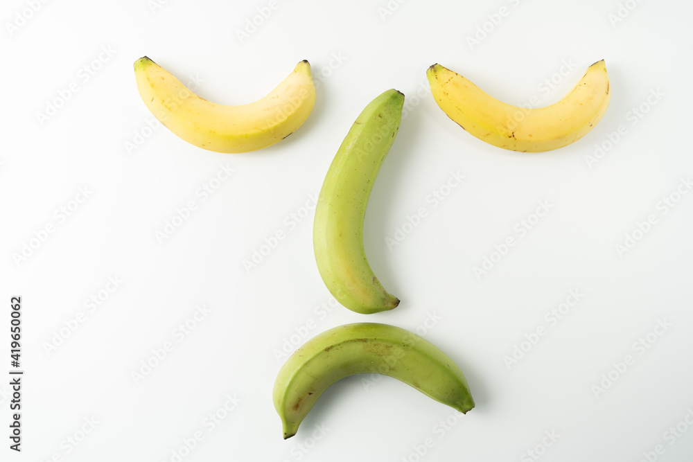 Making facial expressions with bananas